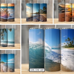 May include: Set of three stainless steel tumblers with different beach scenes. The first tumbler features a seashell on a sandy beach. The second tumbler shows a beach with palm trees and a sunset. The third tumbler has a beach with a wave crashing on the shore.
