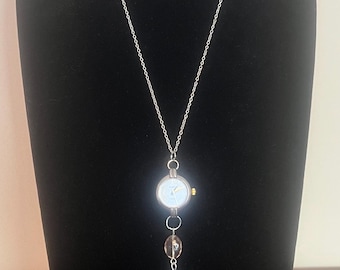 Necklace of vintage watch face on the stainless steel 18 inch chain