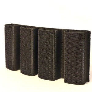May include: Black velcro magazine pouch with four slots for holding magazines.