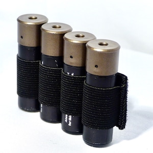 Shotgun shell holder, pouch for four shells