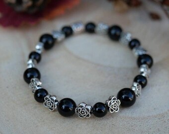 Lithotherapie bracelet in real obsidian with stainless steel flower separators Fine and chic protective bracelet bead of 8 and 6