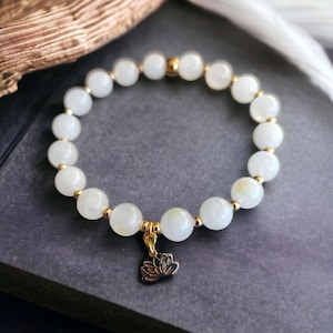 Bracelet made of real pearls, real lithotherapy pearls with golden Lotus in stainless steel, large choice of stones available