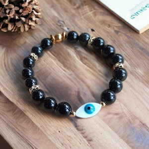 Magnificent Protective Bracelet in Heavenly Eye Obsidian Best Seller Powerful shield against negative energies in 8 mm and stainless steel