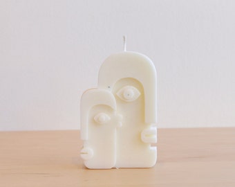 Vela de soja de pareja nórdica: rostro abstracto, decoración minimalista