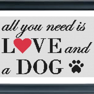 May include: A cross-stitch pattern with the text "all you need is LOVE and a DOG" with a red heart and a black paw print.