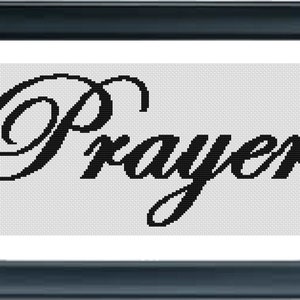 May include: Black and white cross-stitch embroidery of the word "Prayer" in a cursive font.