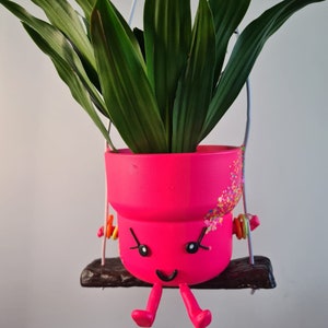 Fluorescent bright pink colour cute character hanging planter available in size 9cm and 12 cm plant pot