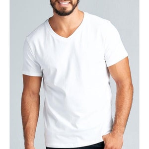 May include: A white v-neck t-shirt with short sleeves.