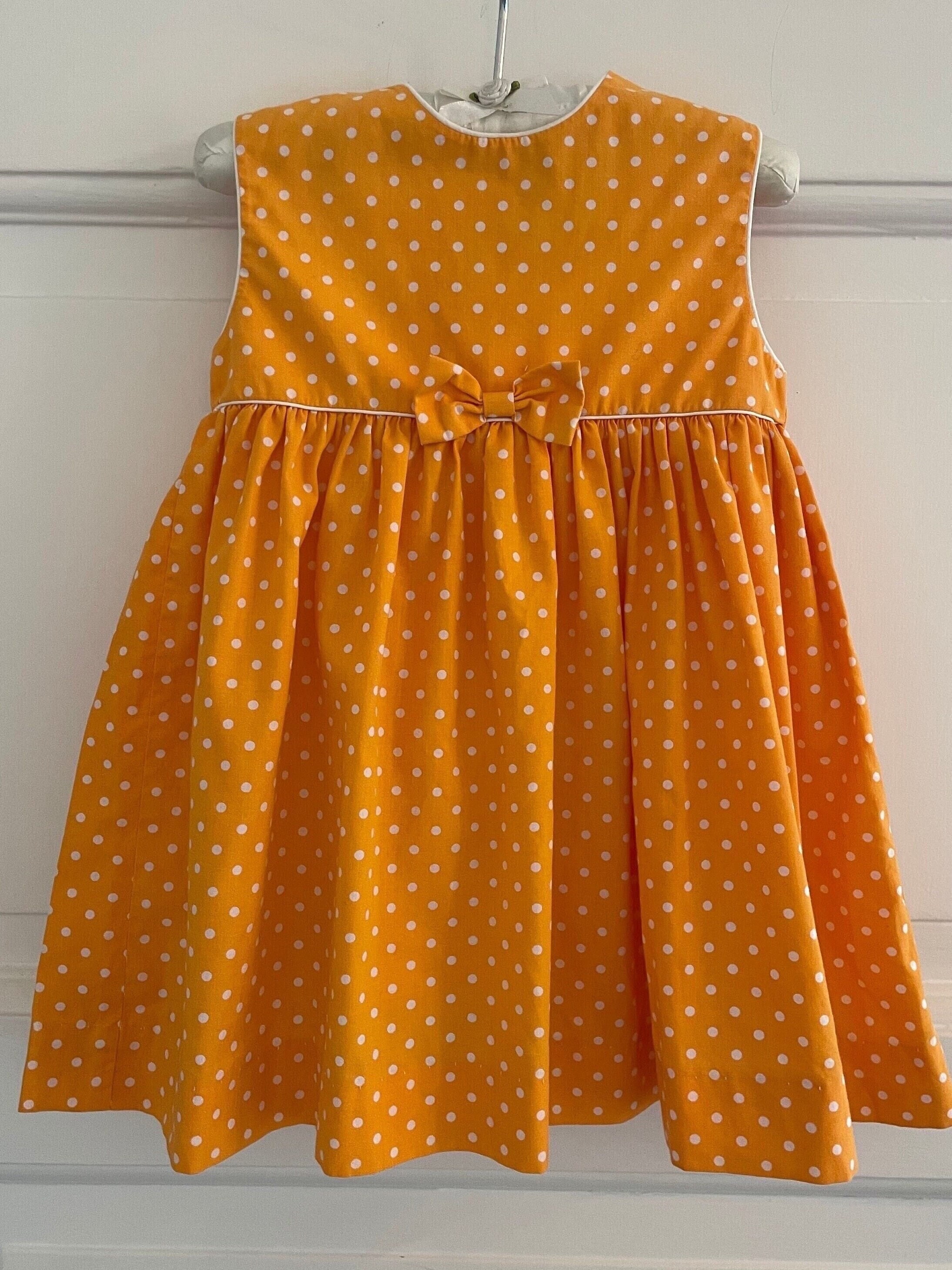 brown and yellow polka dot dress Luna Dress with Polka Dots in Brown/Yellow – Love it Loan it main image 1