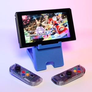 Soporte plegable para Nintendo Switch impreso en 3D: accesorio de juego portátil, soporte de consola ajustable, organizador de escritorio, regalo para jugadores, apto para viajes
