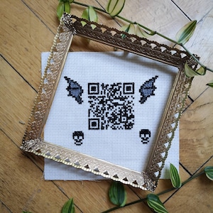 Personalised embroidered QR-code with decoration
