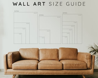 May include: A wall art size guide with a brown leather sofa in front of it. The guide shows different sizes of wall art in three aspect ratios: 3x4, 4x5, and 2x3. The sizes are listed in inches.