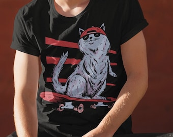 May include: A black t-shirt with a graphic of a cat wearing sunglasses and a red baseball cap, skateboarding. The cat is white with black stripes. The t-shirt is on a person sitting on a skateboard.
