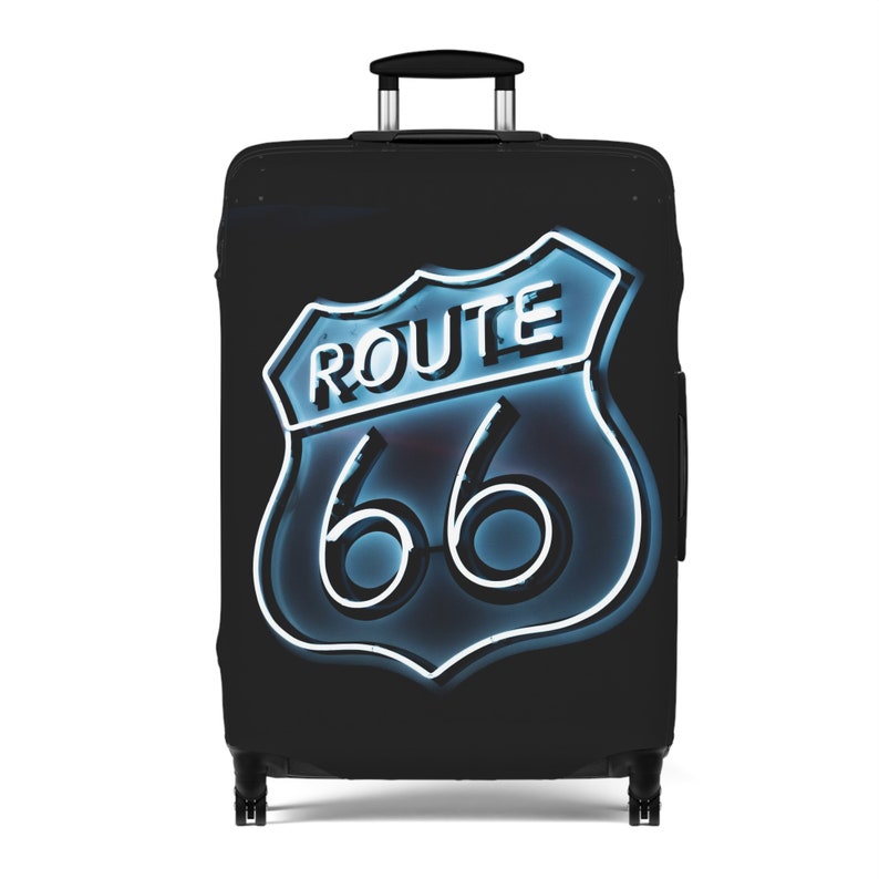 May include: Black suitcase cover with a blue neon Route 66 sign.