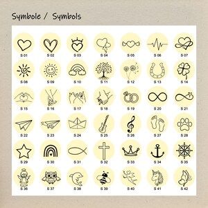 K&ouml;nnte beinhalten: Eine Sammlung von 42 schwarz-wei&szlig;en Strichzeichnungen, jeweils in einem gelben Kreis, darunter Herzen, Kronen und ein Schmetterling. Der Text "Symbole / Symbols" steht oben. Die Symbole sind mit S01 bis S42 nummeriert.