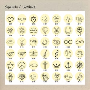 May include: A chart of 42 different symbols, each in a circle with a yellow background. The symbols include hearts, stars, animals, and other common icons. Each symbol is labeled with a letter and number, for example, "S 01" for the first symbol.