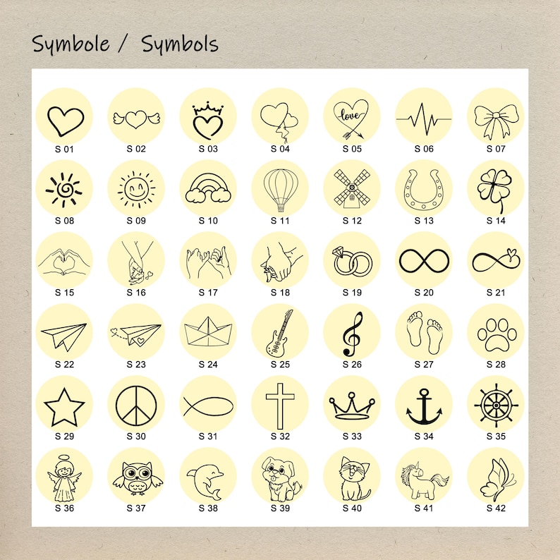 May include: A chart of 42 different symbols, each in a circle with a yellow background. The symbols include hearts, stars, animals, and other common icons. Each symbol is labeled with a letter and number, for example, "S 01" for the first symbol.