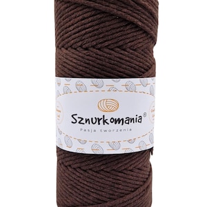 May include: A ball of brown cotton rope, with a white label that reads "Sznurkomania Pasja tworzenia".