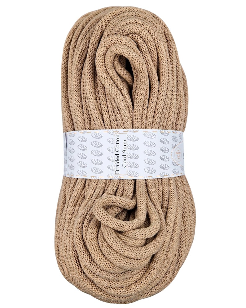 May include: A roll of beige braided cotton cord, 9mm thick. The label reads "Braided Cotton Cord 9mm".