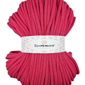 May include: A large spool of bright pink cotton cord, labelled "Sznurkomania Pasja tworzenia".