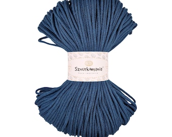 May include: A skein of dark blue cotton cord, wrapped in a white label with the text "Sznurkomania" and "Pasja tworzenia".