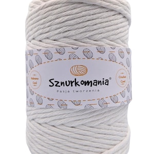 May include: A white ball of cotton cord, labeled "Sznurkomania" with the text "Pasja tworzenia" and "Crochet Cord" in a white and orange label.