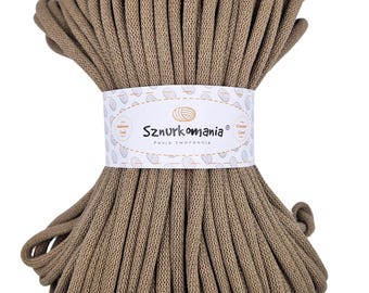 May include: A large roll of brown cotton cord, perfect for crafting projects. The cord is made by Sznurkomania, a Polish company that specializes in crafting supplies.