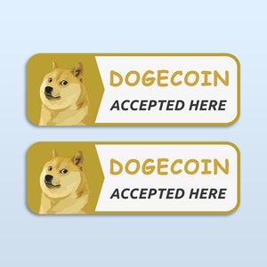 May include: Two yellow and white signs with a Shiba Inu dog image and the text "Dogecoin Accepted Here".