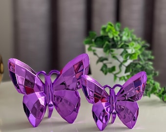Set beeldjes paarse vlinder: modern interieur