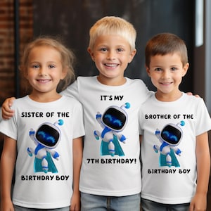 May include: Three white t-shirts featuring a blue and white robot graphic. The left shirt reads SISTER OF THE BIRTHDAY BOY, the center reads IT'S MY 7TH BIRTHDAY, and the right reads BROTHER OF THE BIRTHDAY BOY in black text.
