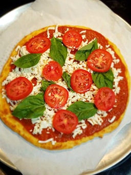 Pizza crust, low carb, 2g carbs per slice, 11 inch crust.