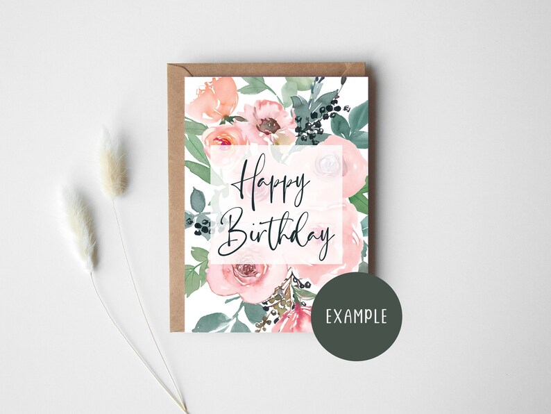 May include: A white card with a watercolor floral design in shades of pink and green. The card says "Happy Birthday" in black script.