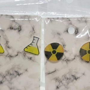 Science icon earrings!  Fun, radiation sign or flasks earrings.