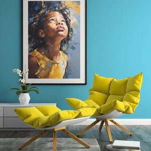 May include: A framed painting of a young girl with dark hair looking up at the sky. The painting is in a modern style with a blue and yellow color scheme. The painting is hanging on a blue wall above a yellow chair and ottoman.