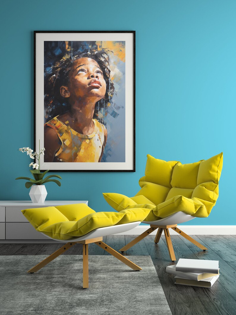May include: A framed painting of a young girl with dark hair looking up at the sky. The painting is in a modern style with a blue and yellow color scheme. The painting is hanging on a blue wall above a yellow chair and ottoman.