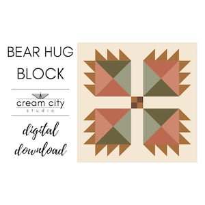 May include: A digital download graphic featuring a Bear Hug Block quilt pattern. The design includes four bear paw shapes in shades of brown, green, and red, set against a cream background. The text "Bear Hug Block" and "digital download" are also included.