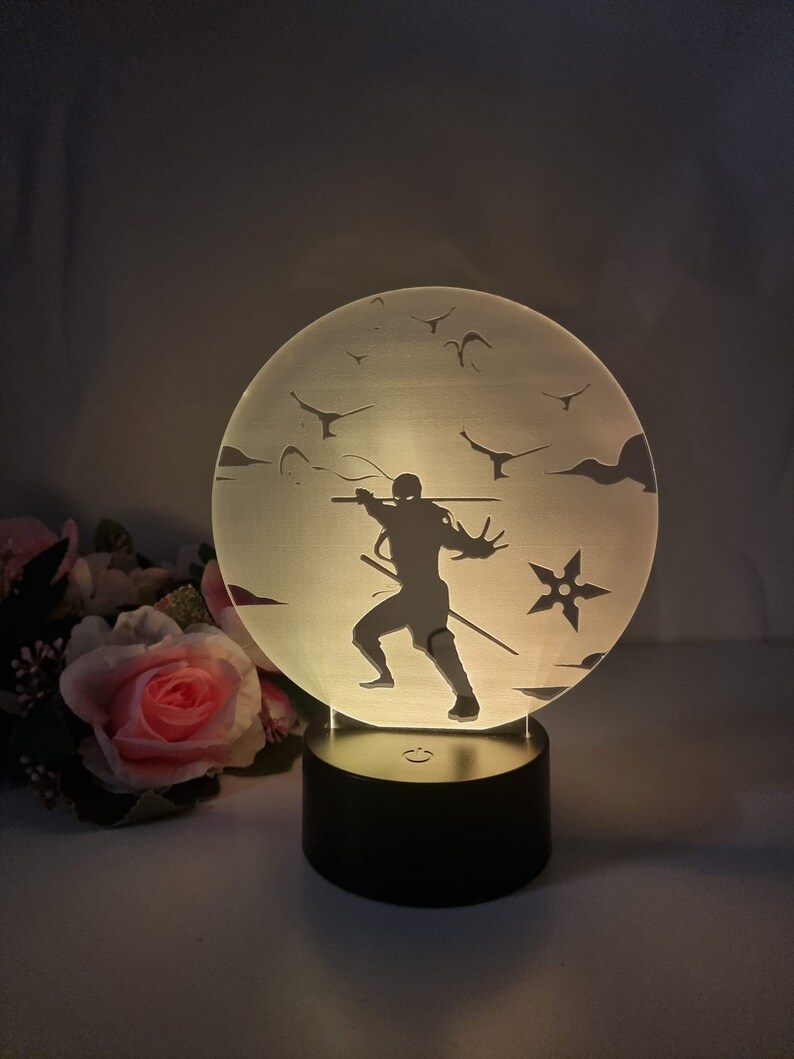 Shinobi - Japanische Lampe – Elegante japanische Lampe mit Shinobi Motiv.