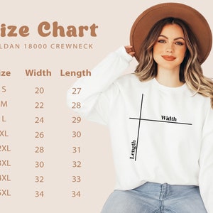 May include: A white Gildan 18000 crewneck sweatshirt with a size chart. The chart shows measurements for sizes S to 5XL, with widths ranging from 20 to 34 inches and lengths from 27 to 34 inches. The text "Size Chart" is at the top.