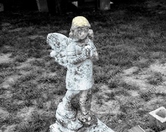 Hidaglo Texas grave stone with child angel statue