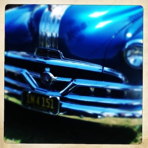Classic Pontiac chrome grill in blue-Partner to the Chief hood ornament image in this store.