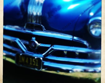 Classic Pontiac chrome grill in blue-Partner to the Chief hood ornament image in this store.