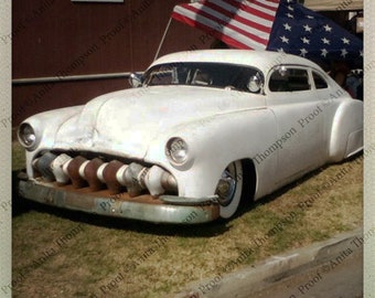 Classic car snap- shot of a 1940's Mercury- Swept out low rider