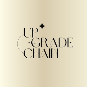 May include: Black and white graphic design with the text "UPGRADE CHAIN" and a small star above the word "UP".