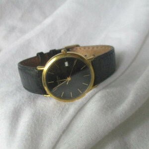 raymond weil 18k gold electroplated water resistant