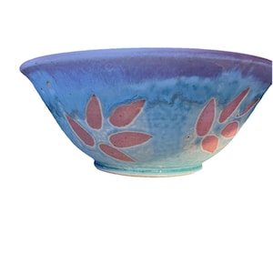 May include: A rustic wooden sign with the text "Welcome to our home" in white lettering. The sign features a distressed finish and a simple, inviting design, perfect for entryway decor.