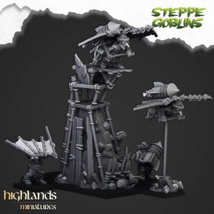 Puede incluir: Un conjunto de miniaturas de resina gris Steppe Goblins con figuras en planeadores propulsados por cohetes, una torre de madera y un duende sosteniendo un cohete. El texto STEPPE GOBLINS y HIGHLANDS MINIATURES es visible en la imagen.