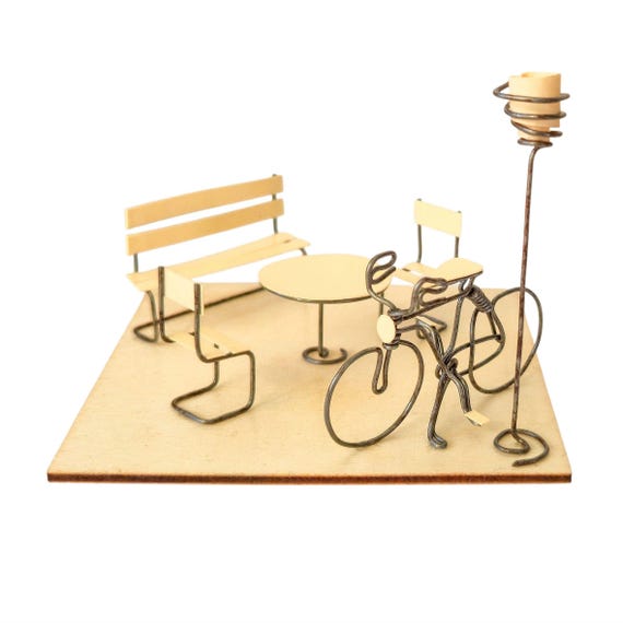 Miniature diorama in wood, metal and paper for interior decoration, cycling scene, 10x10 cm