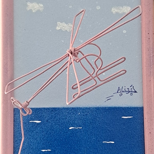 3d helicopter in pink steel wire in photo frame, original gift, helicopter on sea and sky background