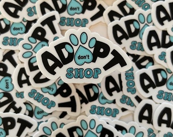 Blauwe vinylsticker Adopt Don't Shop – sticker met hartpootafdruk