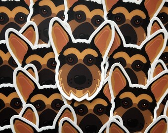 May include: A close-up of a sheet of multiple German Shepherd dog stickers. The stickers are brown, black, and white with a cartoon-like style. The stickers are arranged in a repeating pattern.